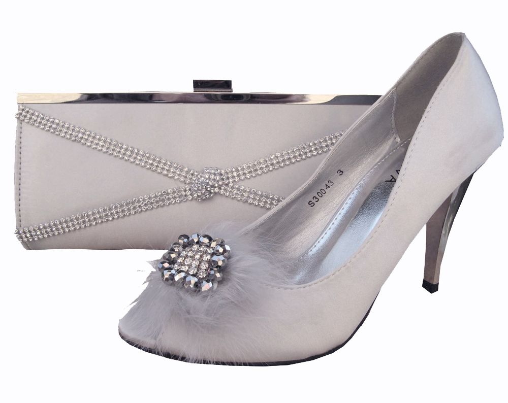 silver court shoes and matching bag